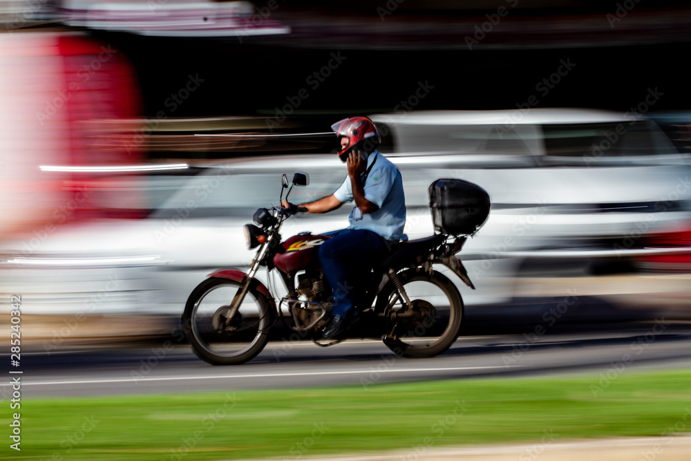 man riding a motorcycle