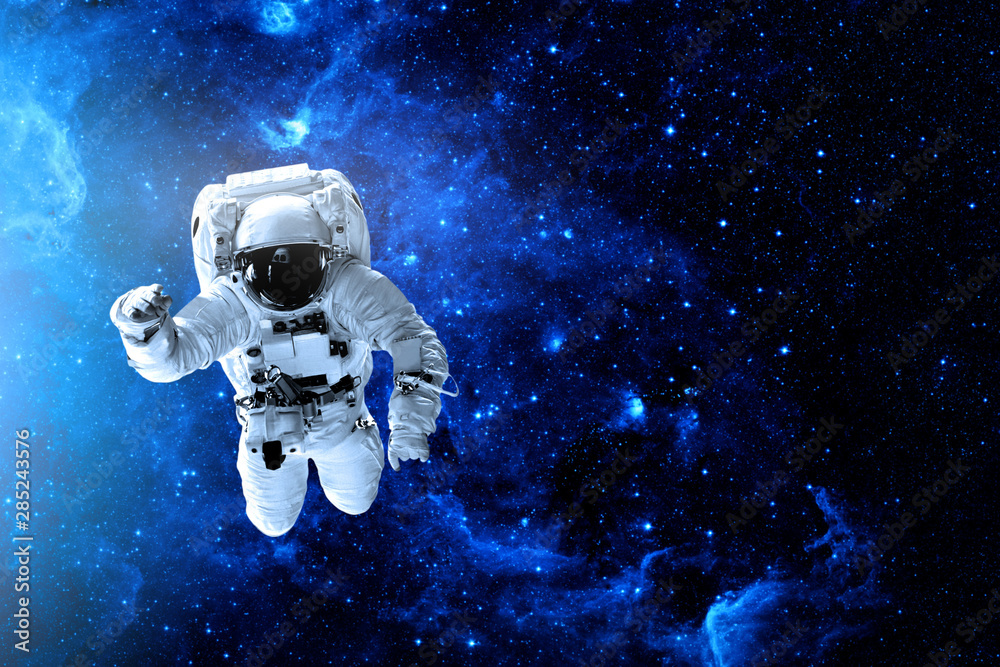 astronaut flies over the earth in space. astronaut flies over the earth in space.