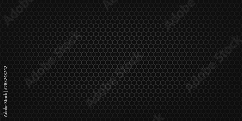 Metal grid surface, on dark background. Industrial technology. Abstract design background template.