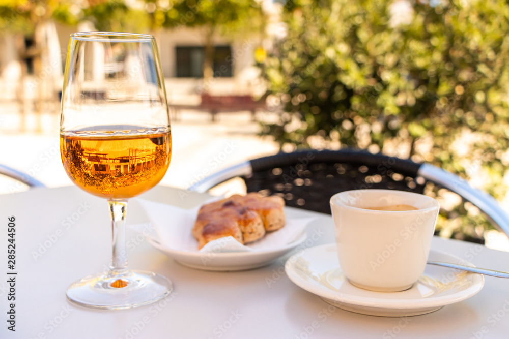 A dessert with Moscatel at a shady place in Portugal