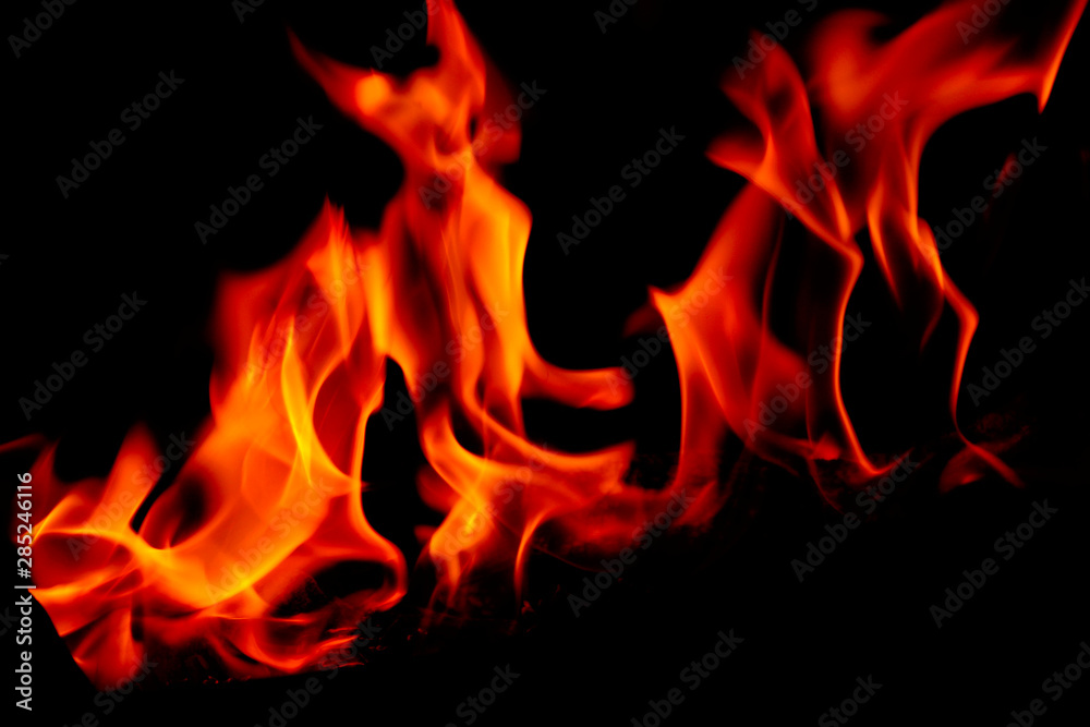 Blurred abstract blaze fire flame texture for banner background. Fire flames on black background. Fires, forest fires, distress. Blurred abstract blaze fire flame texture for banner background. Fire flames on black background. Fires, forest fires, distress.