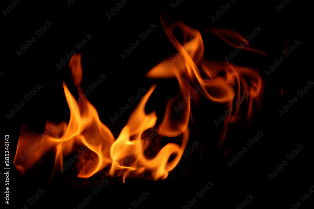 Blurred abstract blaze fire flame texture for banner background. Fire flames on black background. Fires, forest fires, distress. Blurred abstract blaze fire flame texture for banner background. Fire flames on black background. Fires, forest fires, distress.