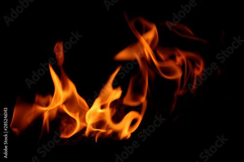 Blurred abstract blaze fire flame texture for banner background. Fire flames on black background. Fires, forest fires, distress.