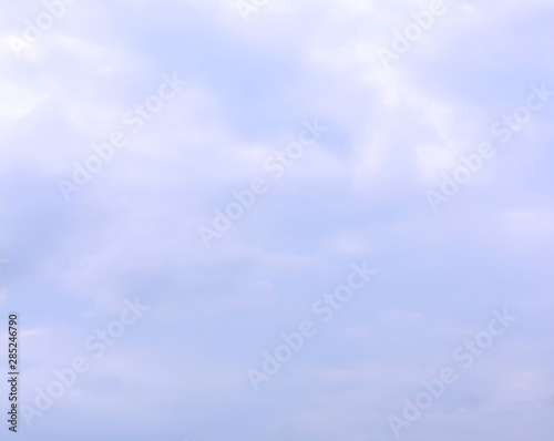 Cloudy sky background square banner. Empty blue sky texture with fluffy story clouds, squared frame view