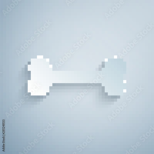 Paper cut Dog bone icon isolated on grey background. Pets food symbol. Paper art style. Vector Illustration