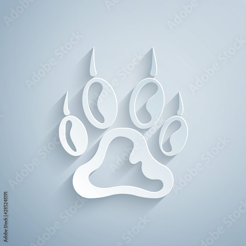 Paper cut Paw print icon isolated on grey background. Dog or cat paw print. Animal track. Paper art style. Vector Illustration
