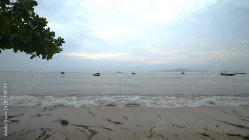 wooden boat on the sea in Thailand photo