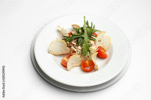 warm seafood salad with arugula and croutons