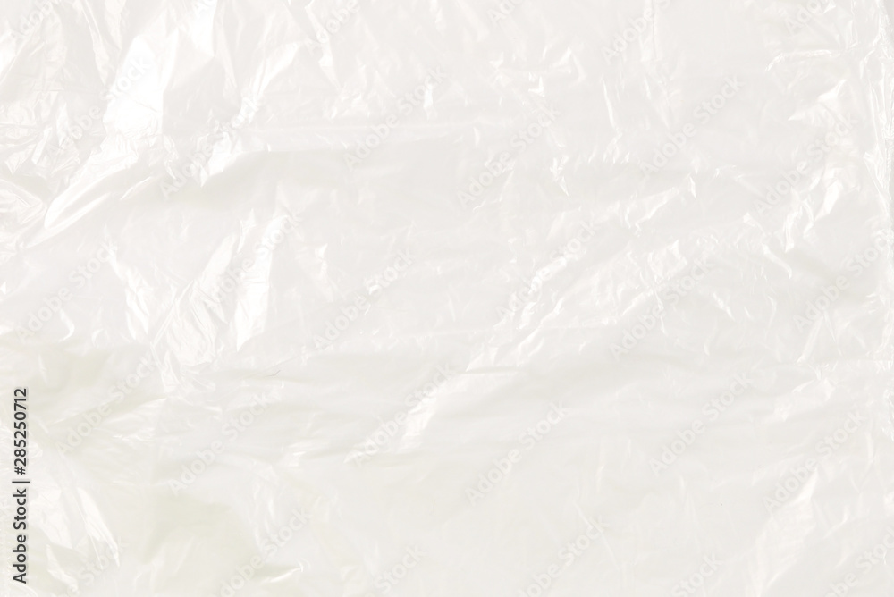 Obraz premium Cellophane bag on a blue background. Top view.