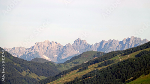 beautiful view in the morning to the wilder kaiser in austria tirol with agriculture fields in the foreground