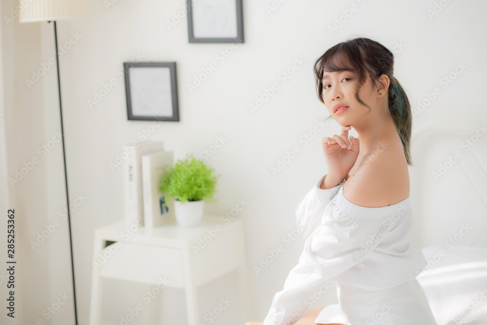 Portrait of beautiful young asian woman makeup of cosmetic, girl happy and smile attractive, face of beauty perfect with wellness in the bedroom at home with skin care and healthcare concept. Portrait of beautiful young asian woman makeup of cosmetic, girl happy and smile attractive, face of beauty perfect with wellness in the bedroom at home with skin care and healthcare concept.