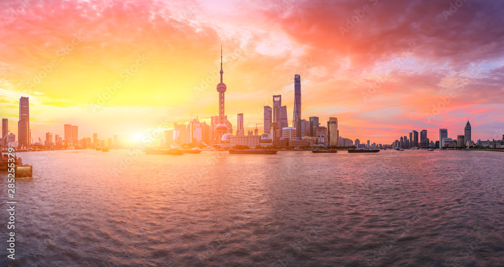 Shanghai skyline and modern buildings at sunrise,panoramic view. Shanghai skyline and modern buildings at sunrise,panoramic view.