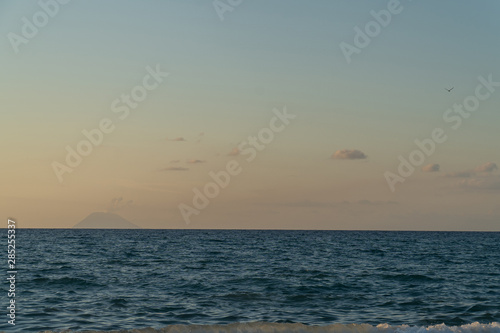 Fototapeta Naklejka Na Ścianę i Meble -  Rodia Beach in Messina - View of the Aeolian islands in Messina