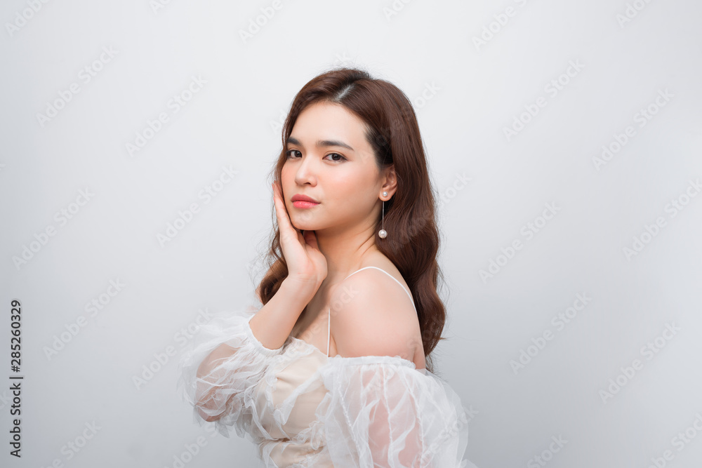 Beautiful woman face close up portrait studio on white background Beautiful woman face close up portrait studio on white background