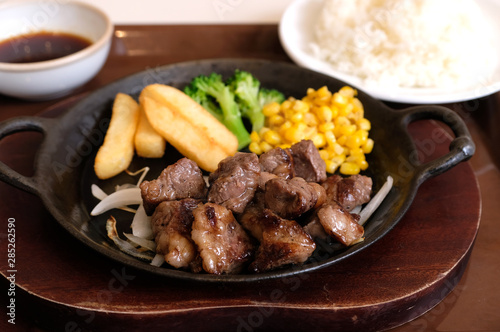 beef steak with corn and rice