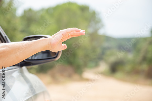 woman hand pulled away of the car window © GC Fotoestudio