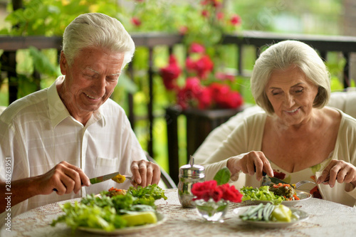 Portrait of happy senior couple having diner © aletia2011