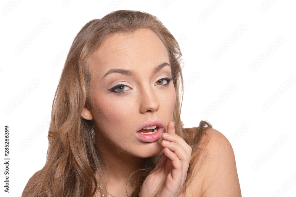 Fototapeta premium Young woman posing isolated on white background