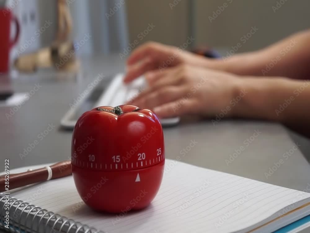 Pomodoro technique low angle, anonymous hands typing productivity concepts, 4k.