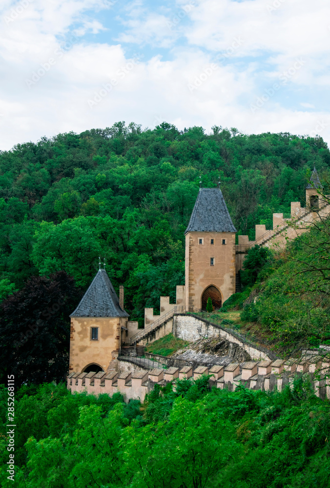 Towers and protective wall of the Karlstejn castle in the Czech Republic Towers and protective wall of the Karlstejn castle in the Czech Republic