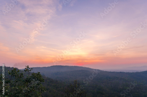Beautiful sunrise over the mountains for background. © Patiwat