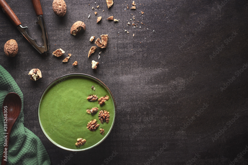 Spinach soup bowl with walnuts. Healthy food Spinach soup bowl with walnuts. Healthy food