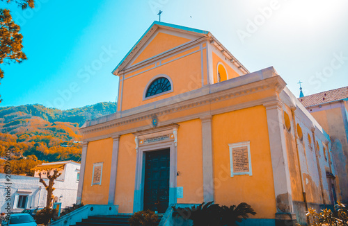 beautiful church at ischa, italy with mountains in the backgroundbeautiful church at ischa, italy with mountains in the background photo