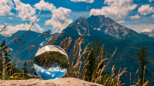 Crystal ball alpine landscape shot at the famous Jenner summit near Berchtesgaden, Bavaria, Germany © Martin Erdniss