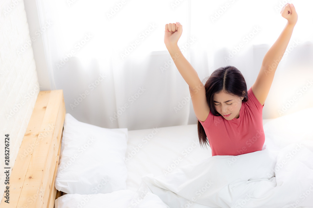 Charming beautiful sexy woman is waking up from bed. Attractive beautiful woman get tried. She has pains and aches her body because she can’t sleep well at night. Lovely woman is stretching arms, body Charming beautiful sexy woman is waking up from bed. Attractive beautiful woman get tried. She has pains and aches her body because she can’t sleep well at night. Lovely woman is stretching arms, body