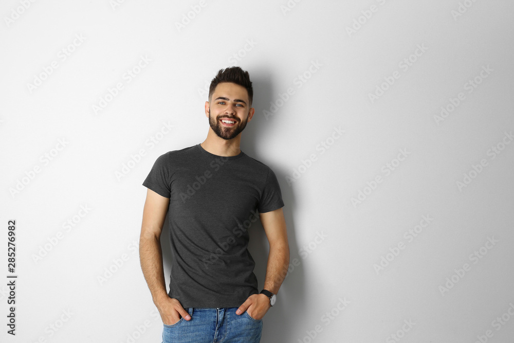 Portrait of handsome smiling man isolated on white - obrazy, fototapety, plakaty 