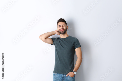 Portrait of handsome smiling man isolated on white