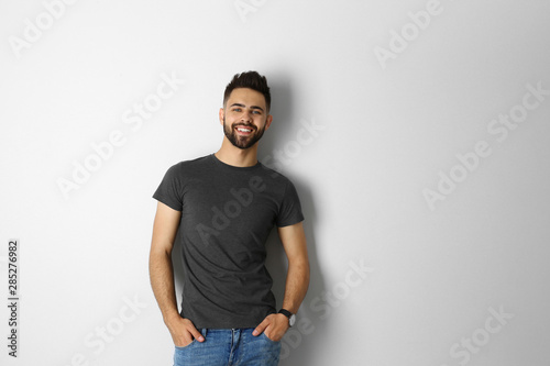 Portrait of handsome smiling man isolated on white