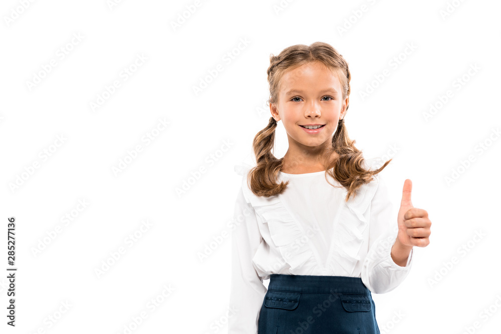 happy schoolkid showing thumb up isolated on white happy schoolkid showing thumb up isolated on white