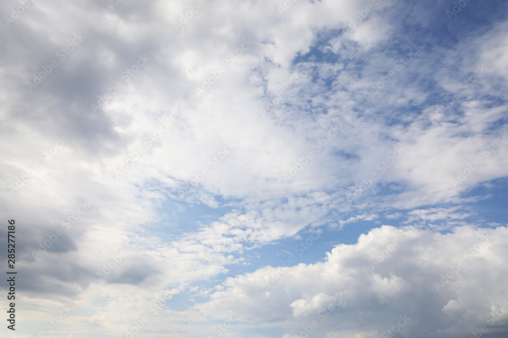 Beautiful view of blue sky with fluffy white clouds Beautiful view of blue sky with fluffy white clouds