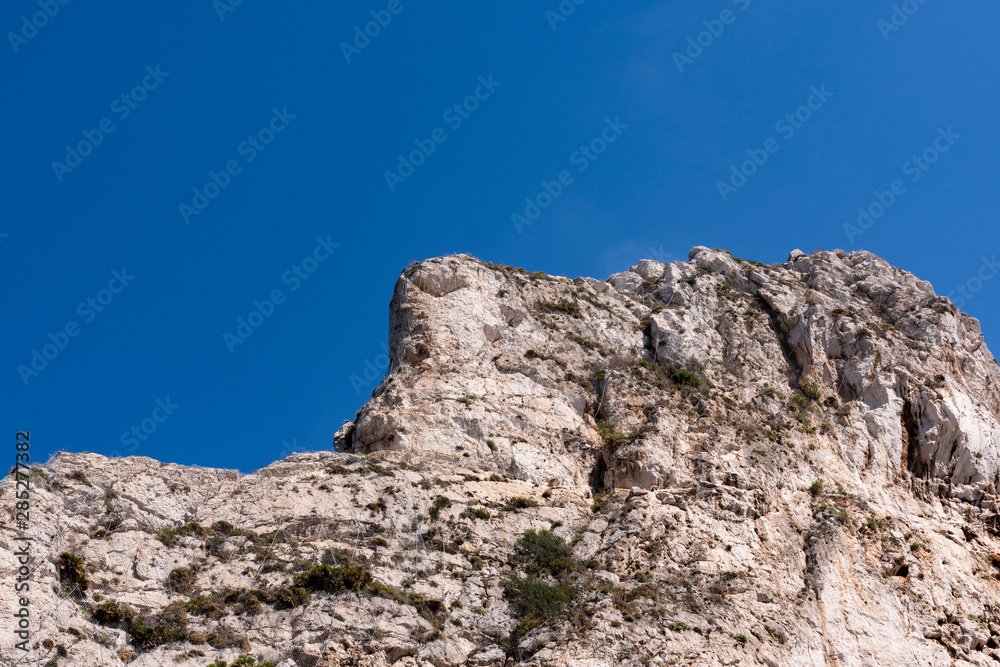 big rocks of a beach in Taormina, Sicily
