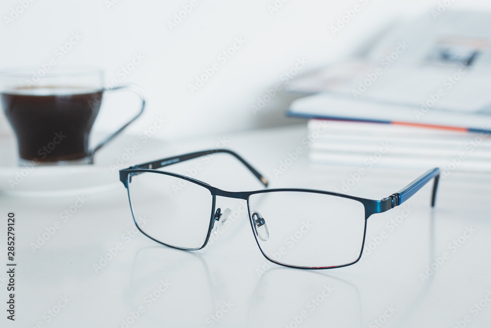 Glasses with book and coffee Glasses with book and coffee