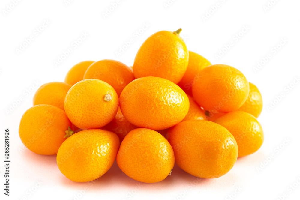 Pile of Kumquats Isolated on a White Background Pile of Kumquats Isolated on a White Background