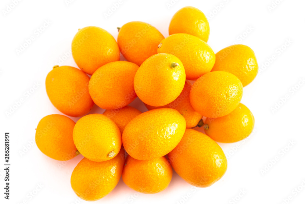 Pile of Kumquats Isolated on a White Background Pile of Kumquats Isolated on a White Background
