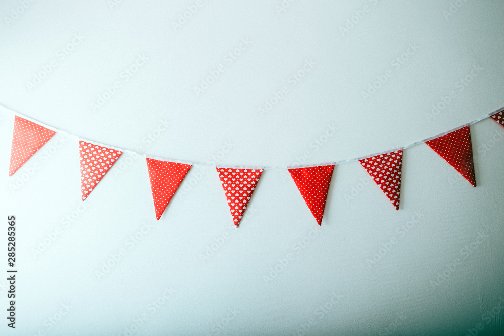 Fototapeta premium colorful party flags made of paper