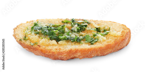 Slice of toasted bread with garlic and herb on white background