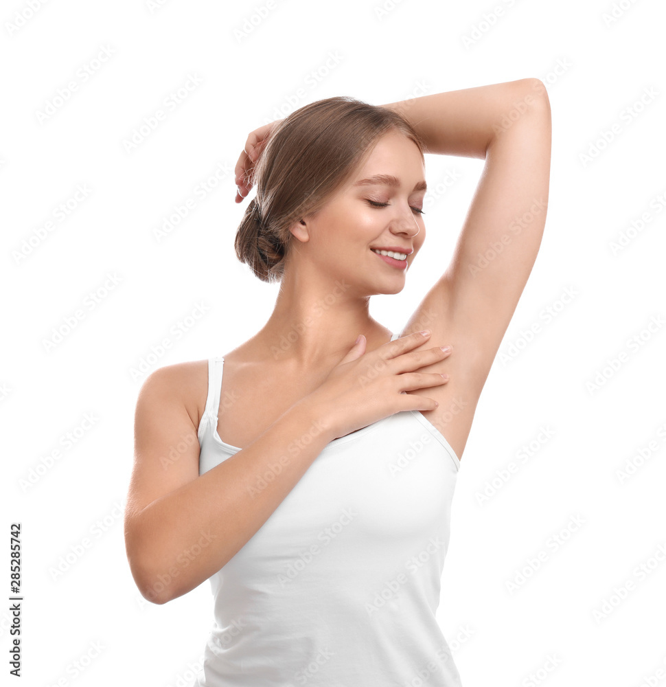 Young woman with smooth clean armpit on white background. Using deodorant Young woman with smooth clean armpit on white background. Using deodorant