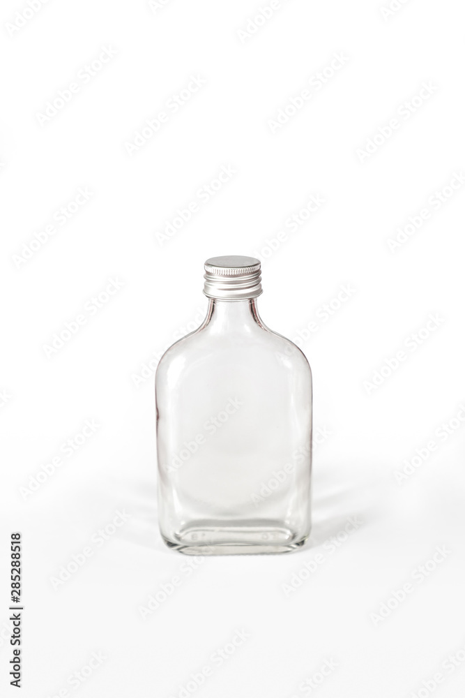 Isolated clear glass bottle white background with clipping path.