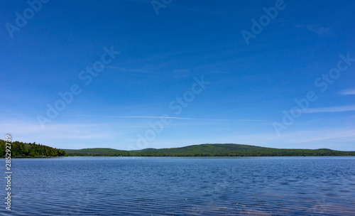 Wide view of Branch Lake in Maine in the summertime