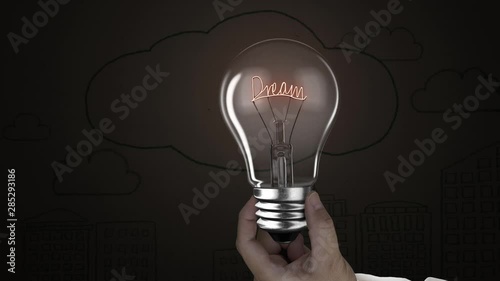 Hand holding lighting bulb lamp with dream shape doodles concrete wall background, 3D rendering animation, macro view