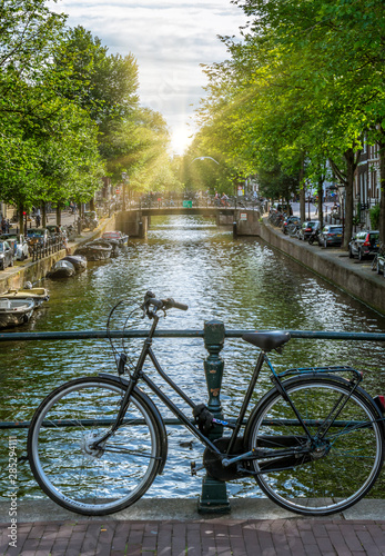 Photography Bicycle on a bridge at a canal in Amsterdam, Netherlands