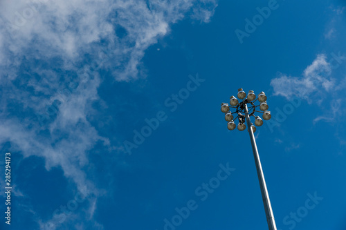 Low angle view of lamppost and clear blue sky photo