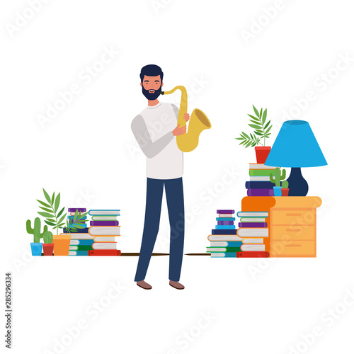 young man with saxophone in living room