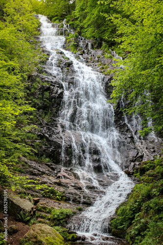 Powerful Piljski waterfall cascading down the rocky cliff during spring on Old mountain