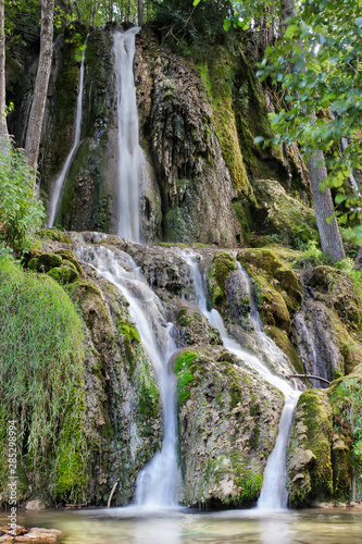 Multiple silky water streams of waterfall Bigar on Old mountain in Serbia   near the city of Pirot and Kalna