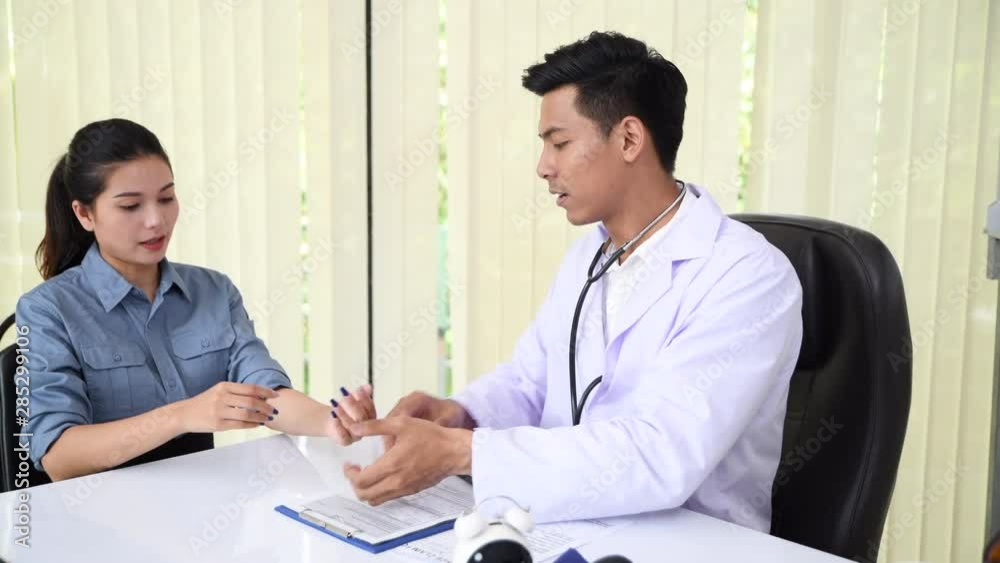 Doctor having medical appointment with patient in hospital Doctor having medical appointment with patient in hospital